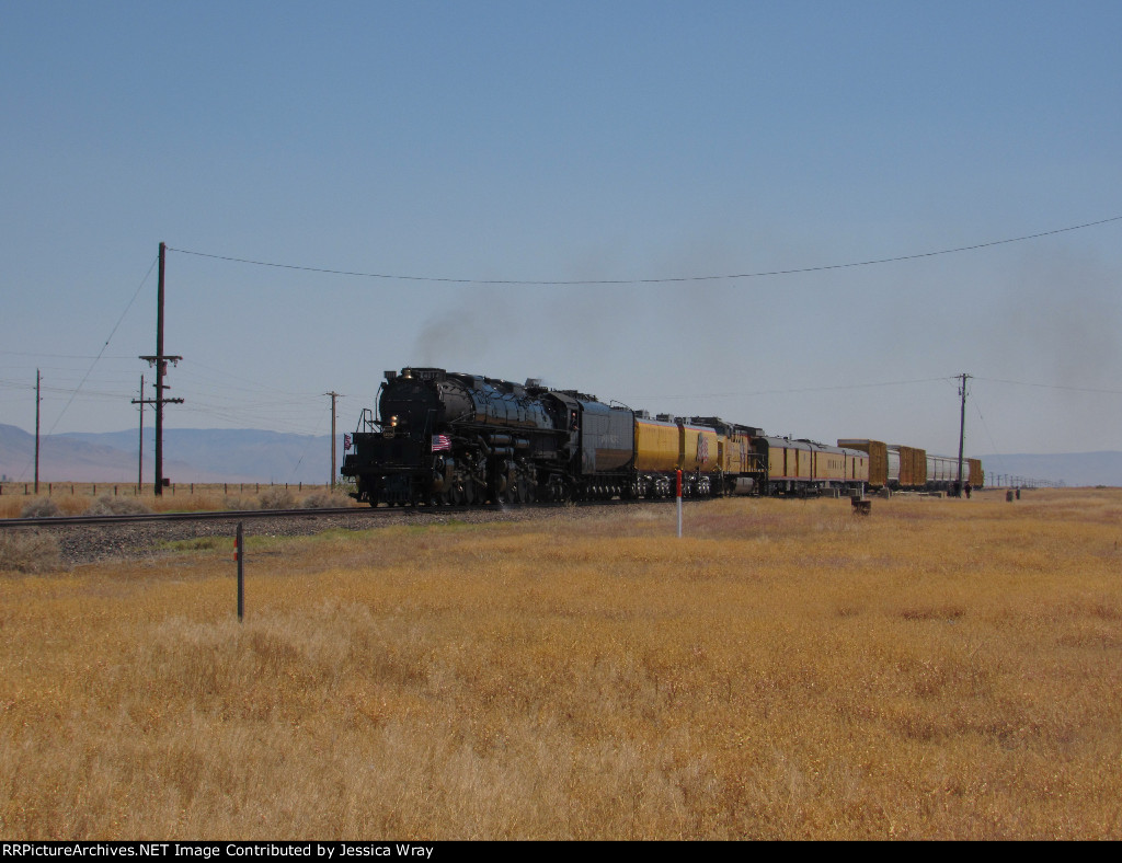 UP 4014 passes SP steam-era ruins at Valmy